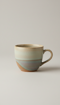 Ceramic cup with ergonomic handle